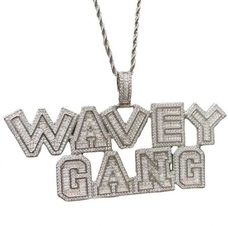 A complete custom name pendant necklace featuring 'WAVEY GANG' in silver with diamond accents.