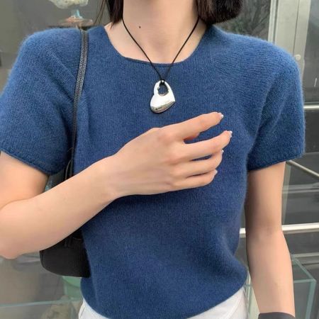 Model wearing the minimalist Korean style comb pendant necklace.