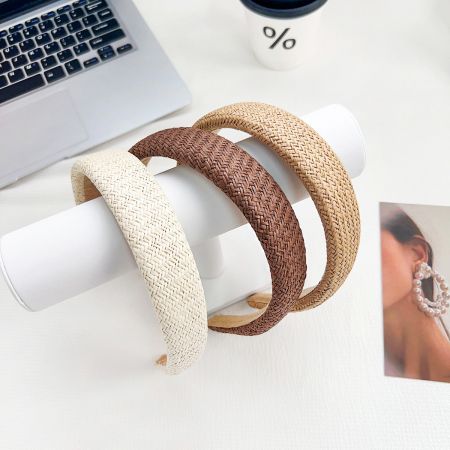 Three woven headbands displayed together, showing the different shades.