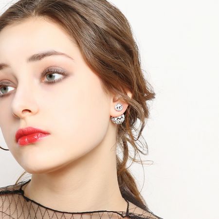 Model showcasing the elegant Double Ball Pave Diamond Front Back Earrings, highlighting their sparkle and style.