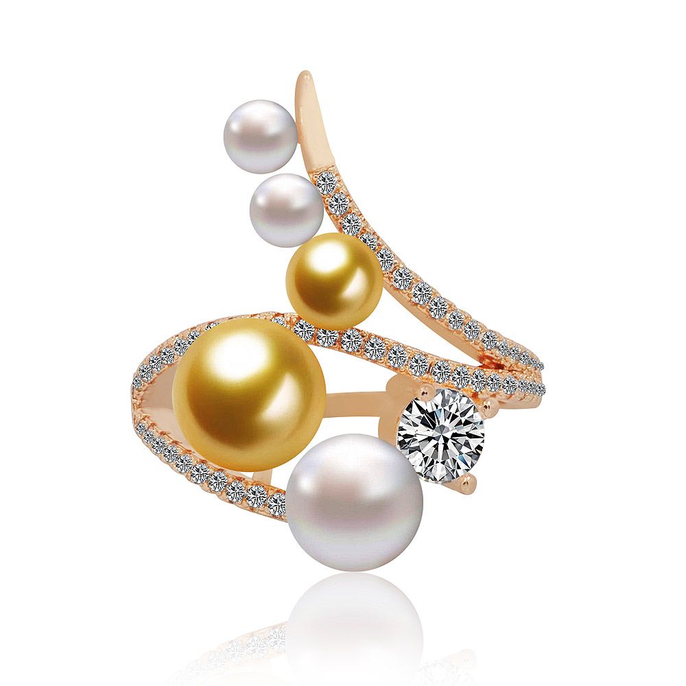 A close-up of the Pave Set Pearl Ring, showcasing its intricate design with a mix of golden and white pearls and sparkling cubic zirconia on a rose gold band.