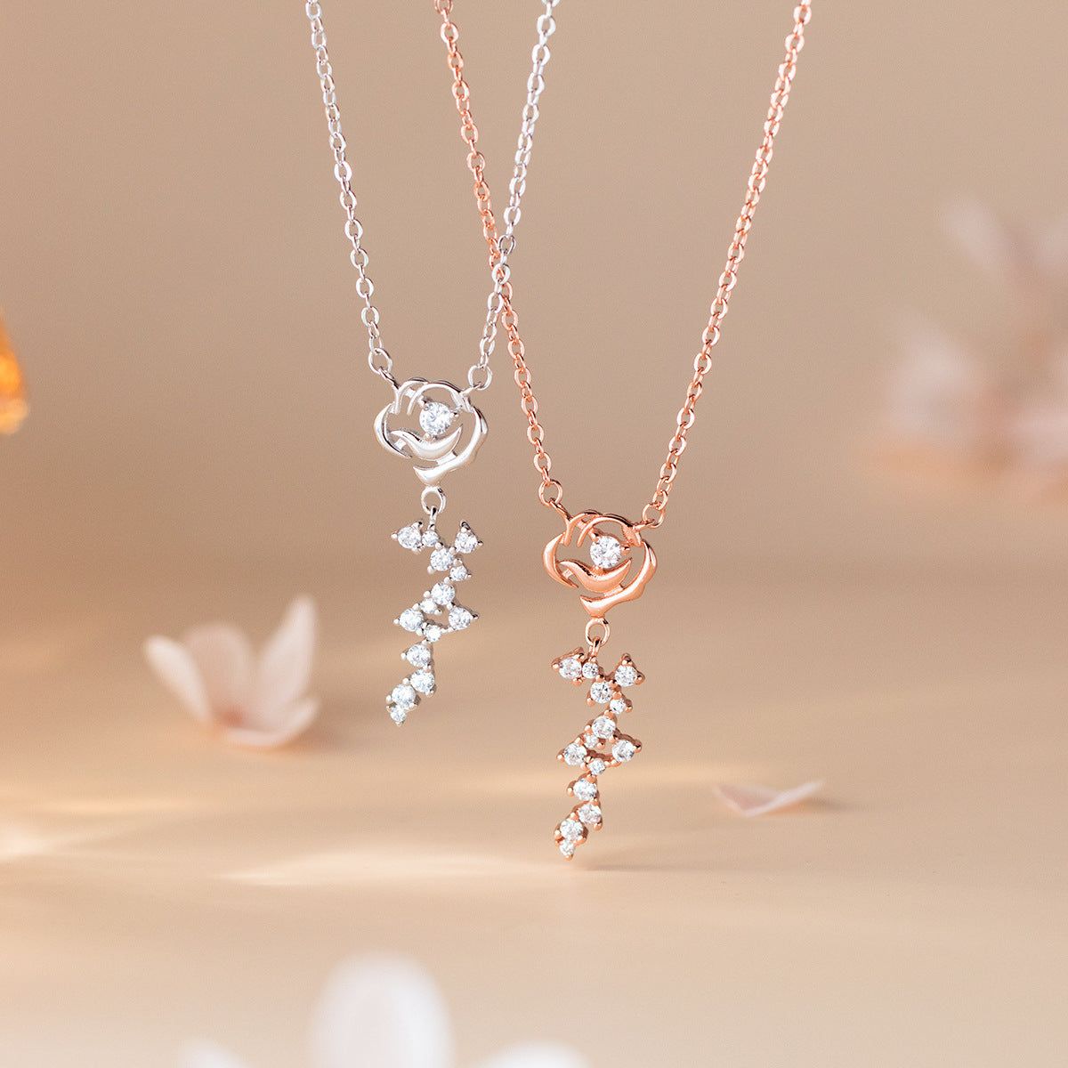 A set of elegant 925 sterling silver necklaces with delicate, floral-inspired rose pendants, showcasing fine craftsmanship.