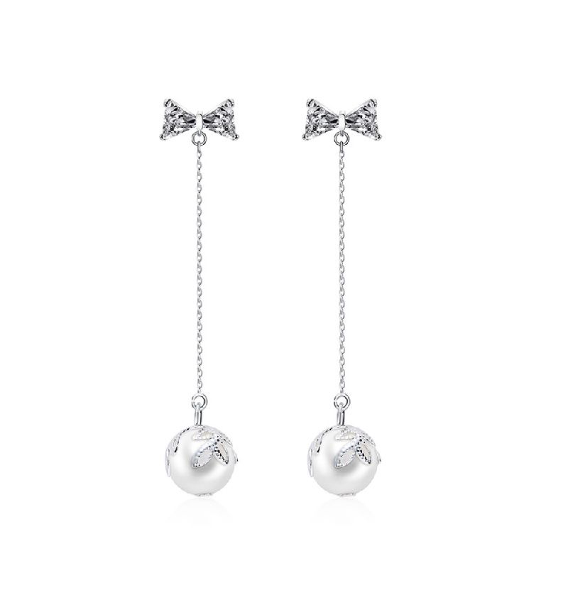 A pair of CZ Ribbon Chain Dangle Earrings (JRE-091) with silver bow-shaped studs and dangling pearl charms, showcasing the rhodium-plated brass finish.