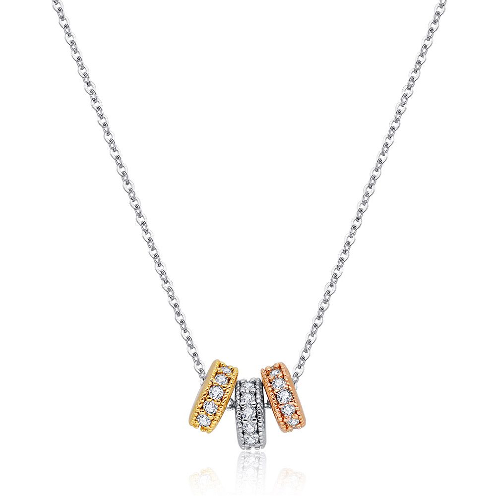 Close-up of the 3 Circle Necklace with Zirconia, showing the three-tone plating in rhodium, gold, and rose gold on interlocking rings.