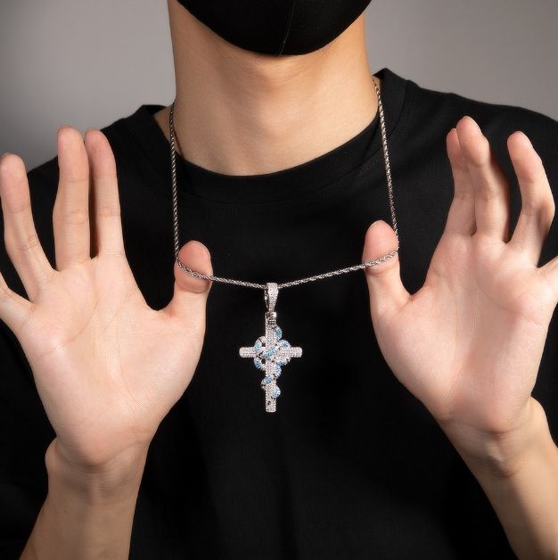 A detailed silver cross pendant for a custom hip hop necklace, showcasing the expert craftsmanship of JR Fashion Accessories.