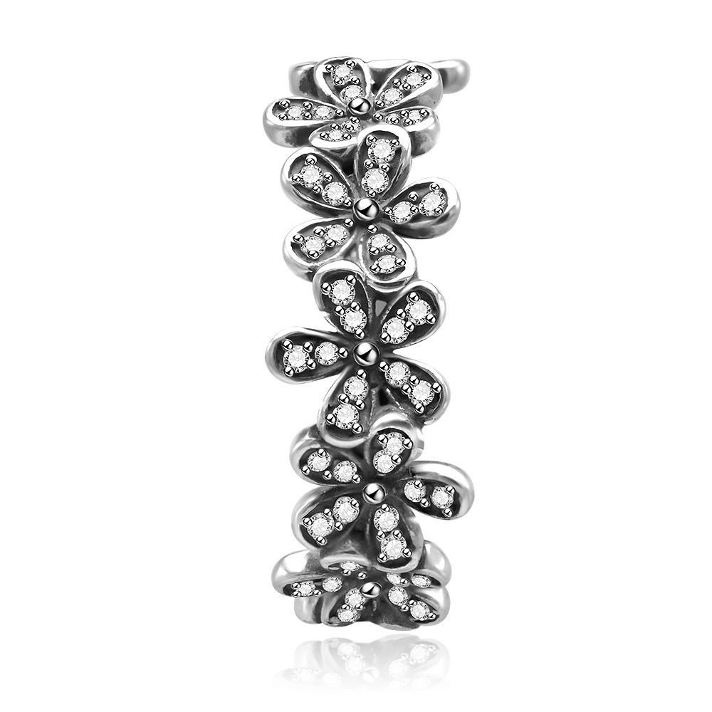 Close-up of the Sterling Silver Dazzling Daisy Band Ring, showcasing its intricate floral design with multiple stacked daisy elements adorned with sparkling cubic zirconia.
