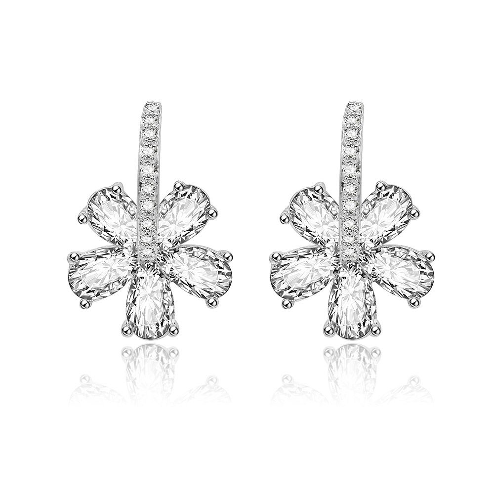 A close-up of the Crystal Hibiscus Flower Drop Earrings, showcasing the rhodium-plated brass in a floral design with five teardrop-shaped cubic zirconia stones surrounding a central stone.