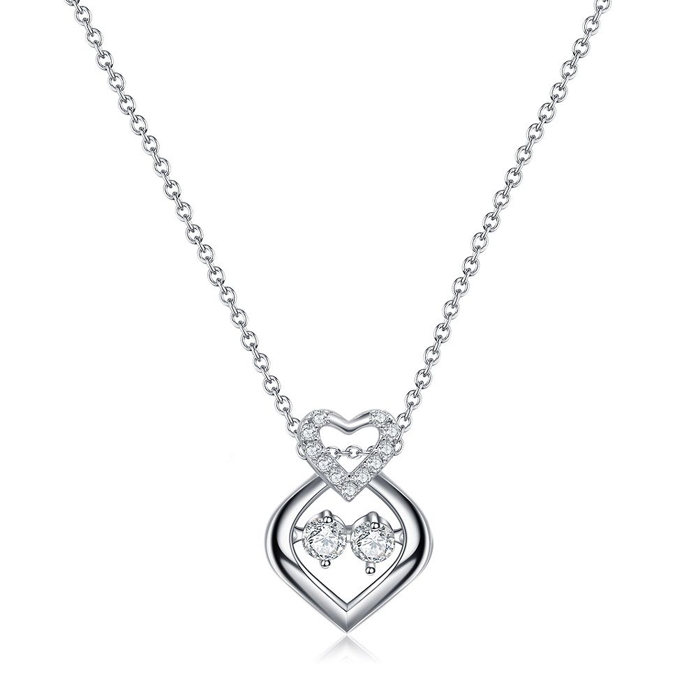 En detaljerad vy av den rhodiumbelagda Silver Dancing CZ Heart Pendant Necklace, som visar den intrikata dubbla hjärtdesignen och glittrande kubiska zirkonstenar.