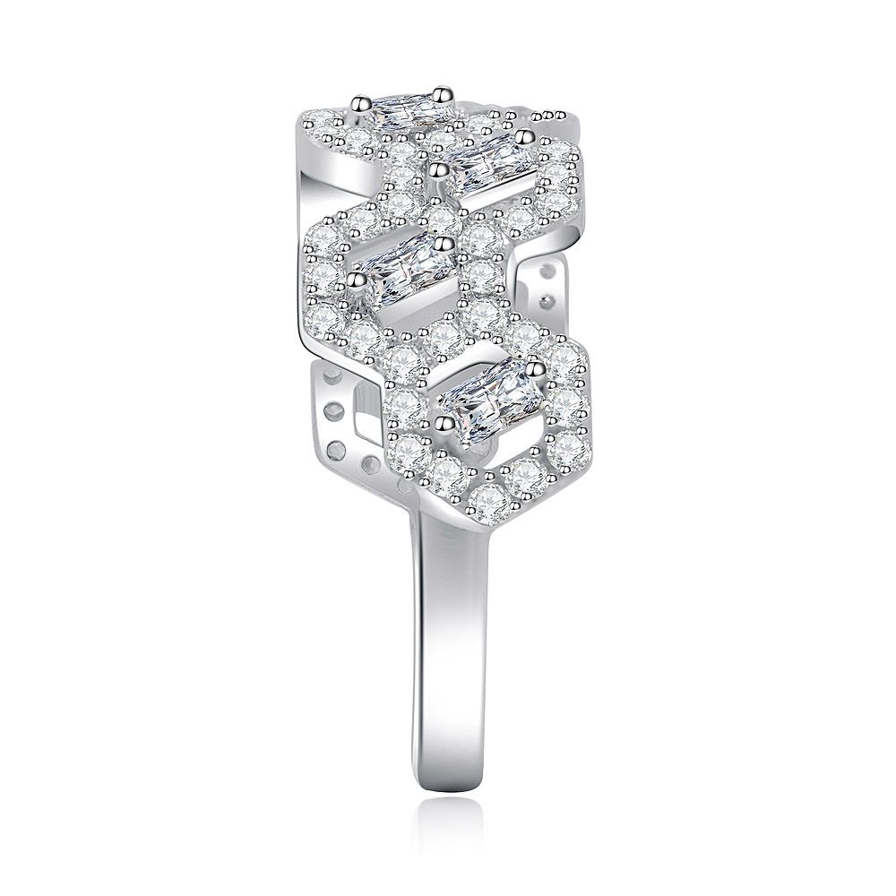 A close-up of the Stylish Zircon Studded Brass Ring, showcasing its intricate interlocking design and sparkling cubic zirconia gems set in rhodium-plated brass.