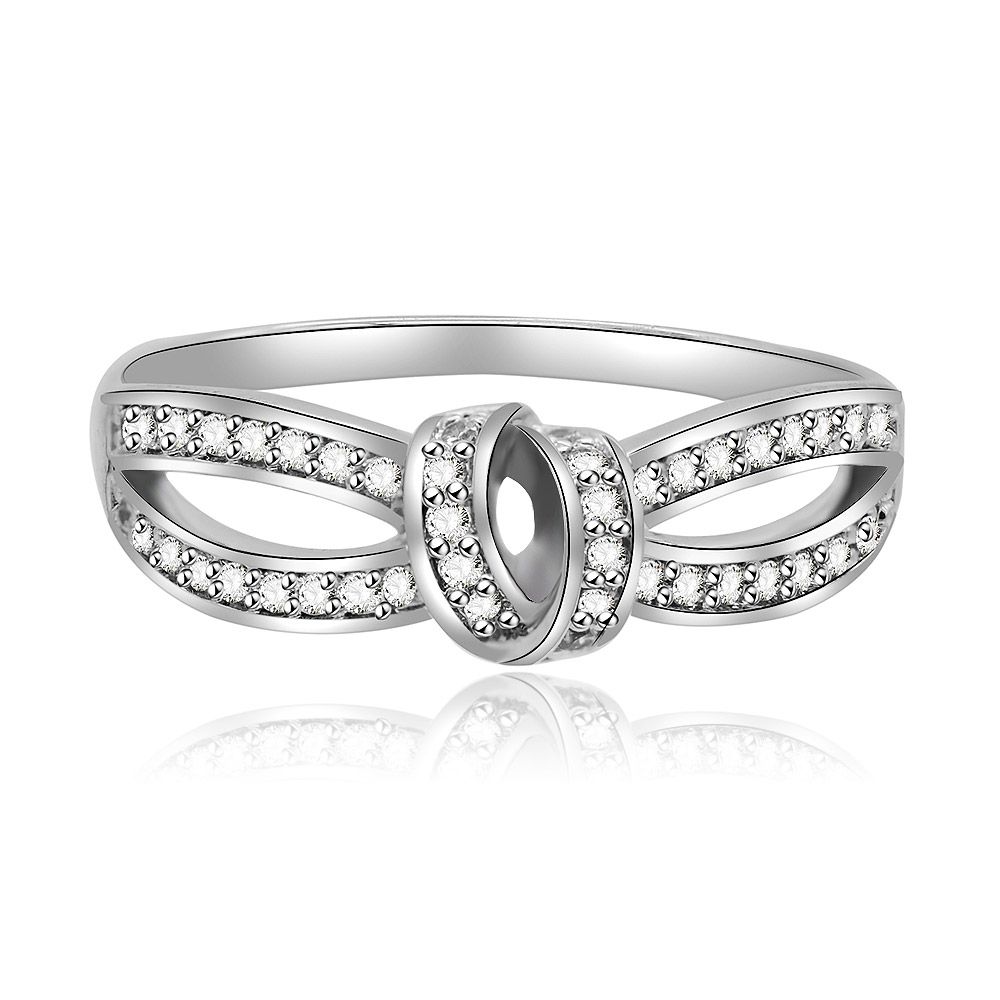 Bow Knot Ring with an intertwined design, made from rhodium-plated brass and accented with cubic zirconia stones.