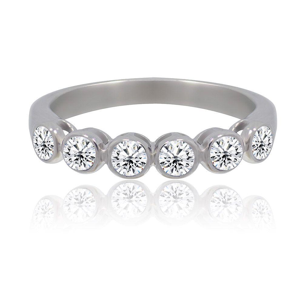A close-up view of the Bezel Set Stackable Band Ring, showcasing its five bezel-set white cubic zirconia stones on a rhodium-plated band.