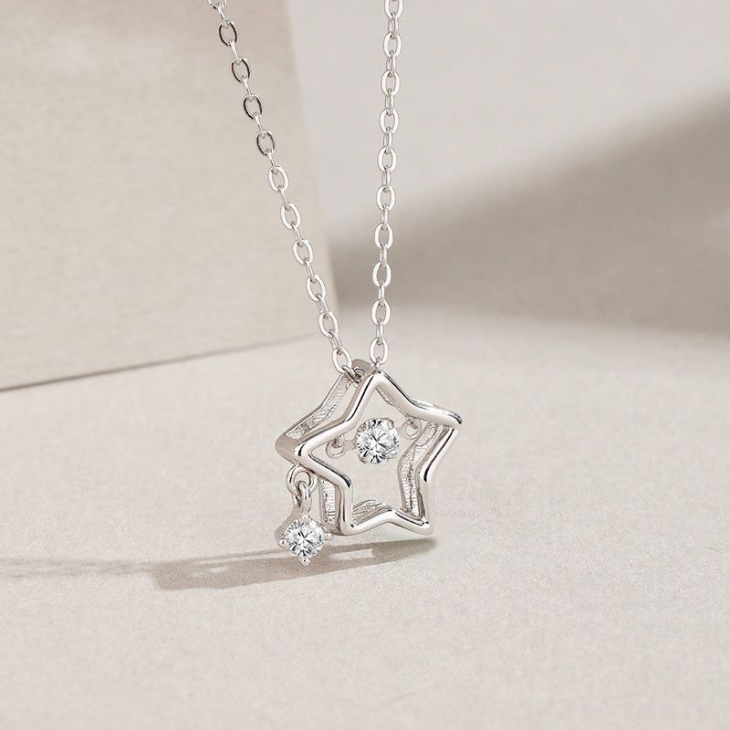 A delicate 925 sterling silver hollow star choker necklace with sparkling zircon gemstones, part of a set of five.