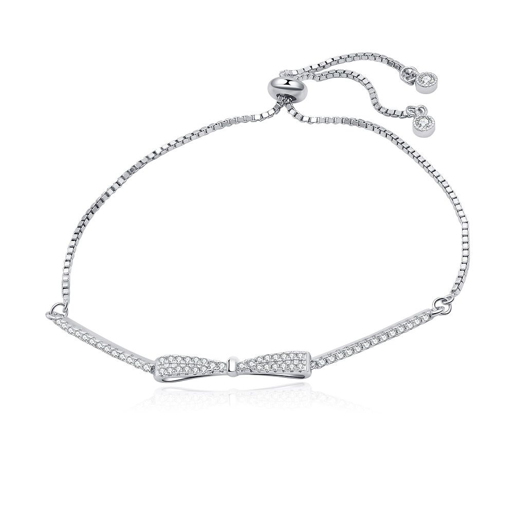 A close-up of the Sterling Silver Pave Bow Bolo Bracelet, showcasing the intricate bow design adorned with sparkling cubic zirconia stones and its adjustable sliding clasp on a clean white background.
