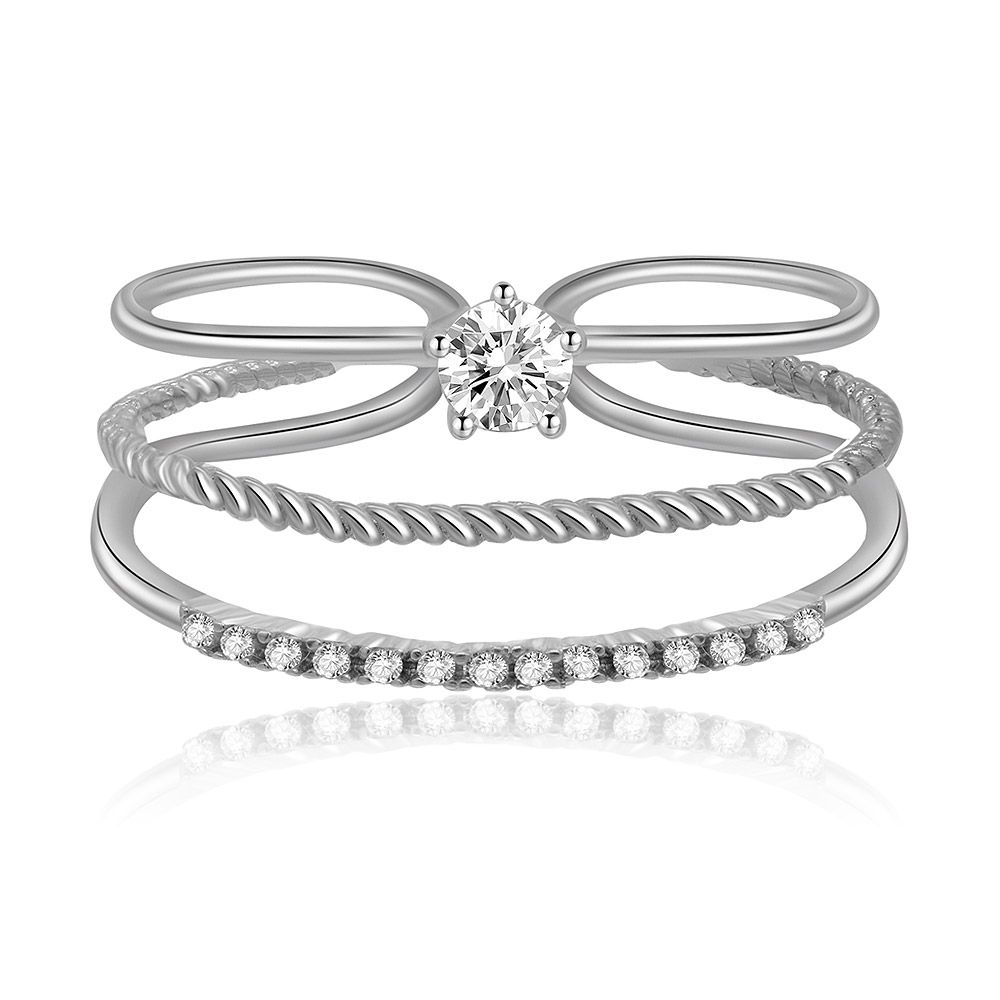 A stack of three 925 sterling silver rings adorned with sparkling white cubic zirconia, showcasing the stackable design.