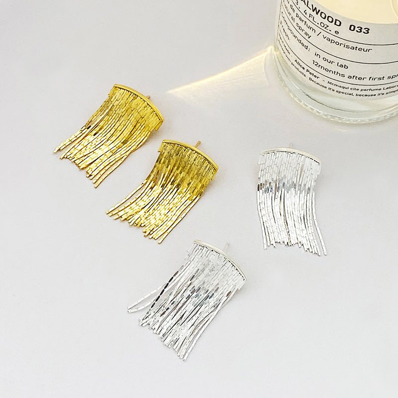 A product shot of S925 sterling silver waterfall short tassel drop earrings, displayed in both silver and gold finishes.