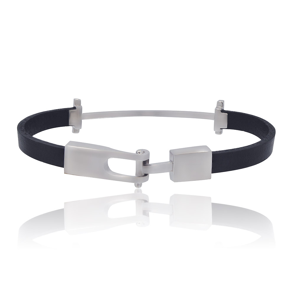 The Half N Half T Bar Cuff bracelet, showcasing its dual design of black leather and rhodium-plated 925 sterling silver with a sparkling cubic zirconia T-bar clasp.