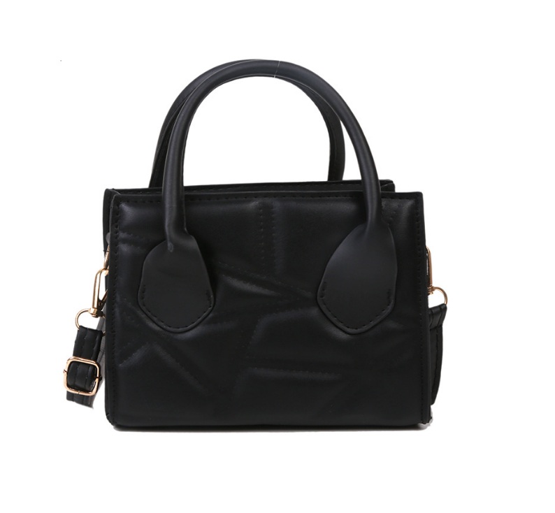 A stylish black leather handbag with a structured design, featuring two top handles, a detachable shoulder strap, and elegant gold hardware.