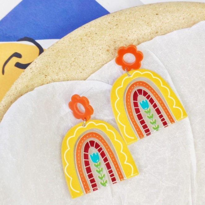 A close-up of the Colorful Rainbow Acrylic Earrings, showcasing the vibrant colors and delicate floral details on the alloy base.