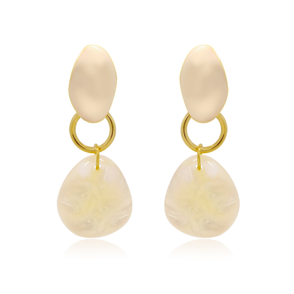 Bella Dangle Earrings featuring a cream-colored oval top and teardrop-shaped bottom with elegant gold accents, on a white background.