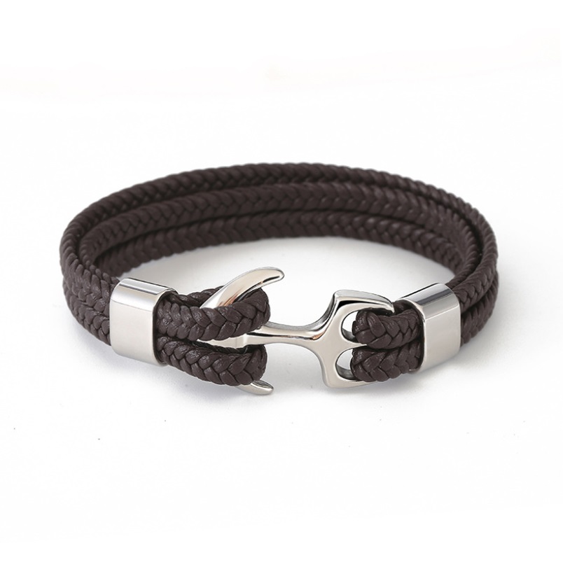A men's stainless steel anchor bracelet featuring a dark brown braided genuine leather band and a polished silver anchor clasp.