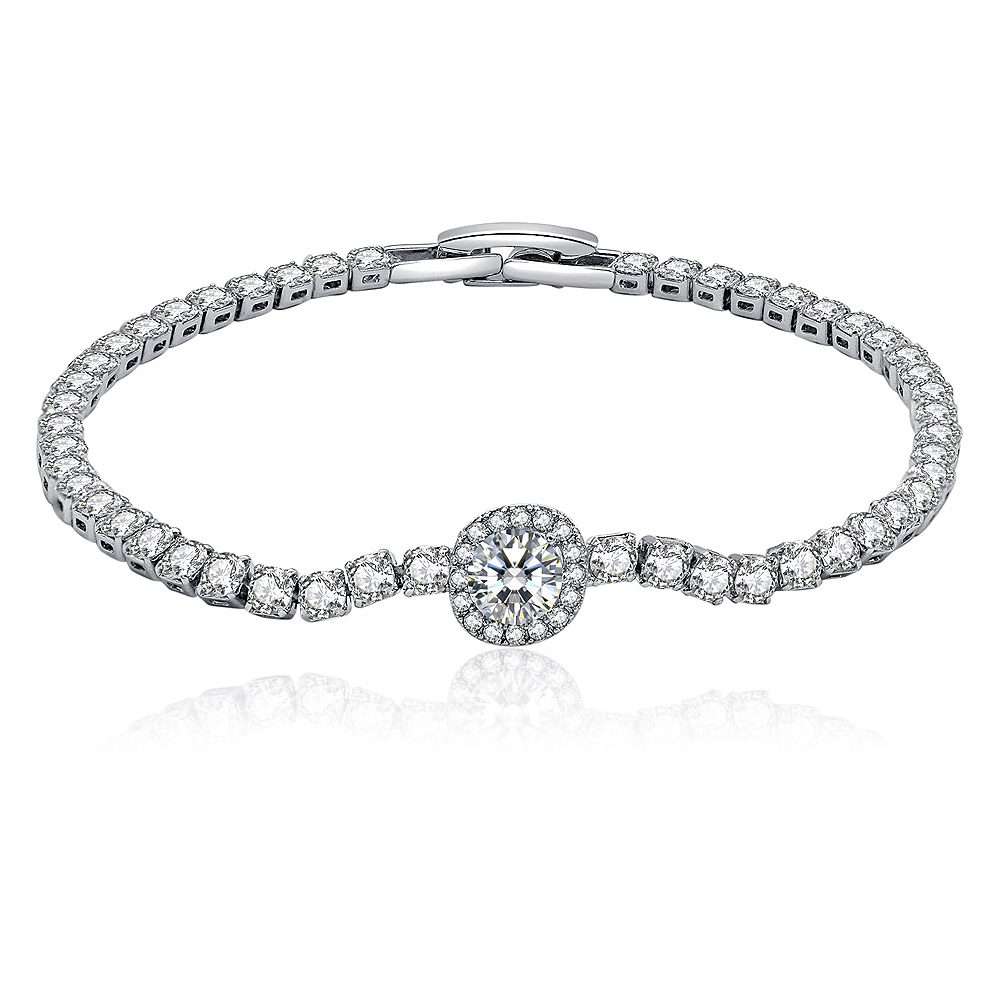 Close-up of the Round 2MM CZ Silver Tennis Bracelet, showcasing the central large cubic zirconia stone surrounded by smaller stones in a silver-toned setting.