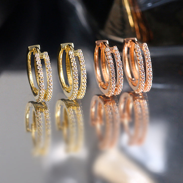 A product shot of 925 sterling silver double row rhinestone small hoop earrings, displayed in both silver and rose gold finishes.