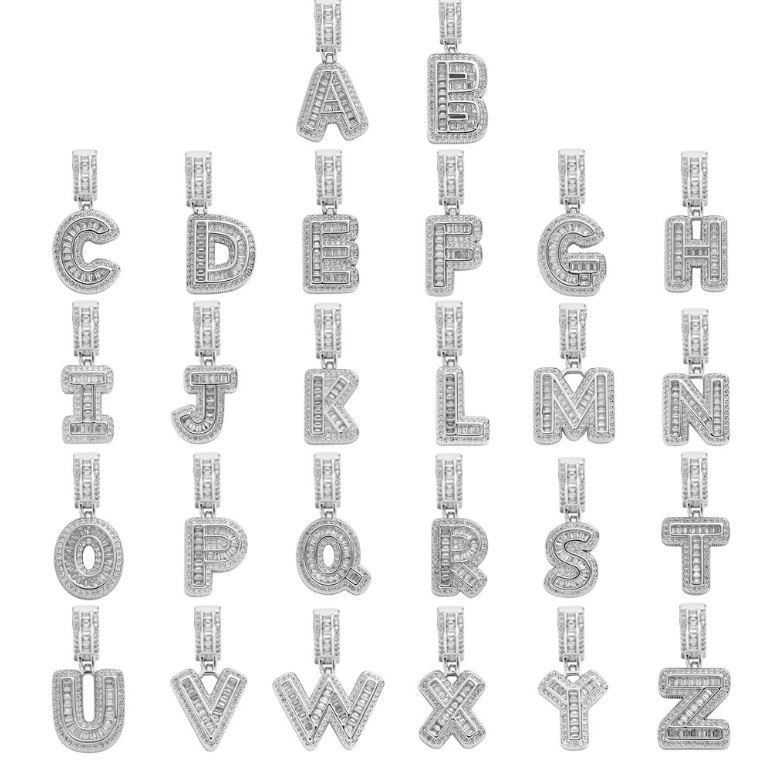 A full alphabet collection of custom diamond-encrusted initial letter pendants, showcasing the manufacturing capabilities of JR Fashion Accessories for hip hop jewelry.