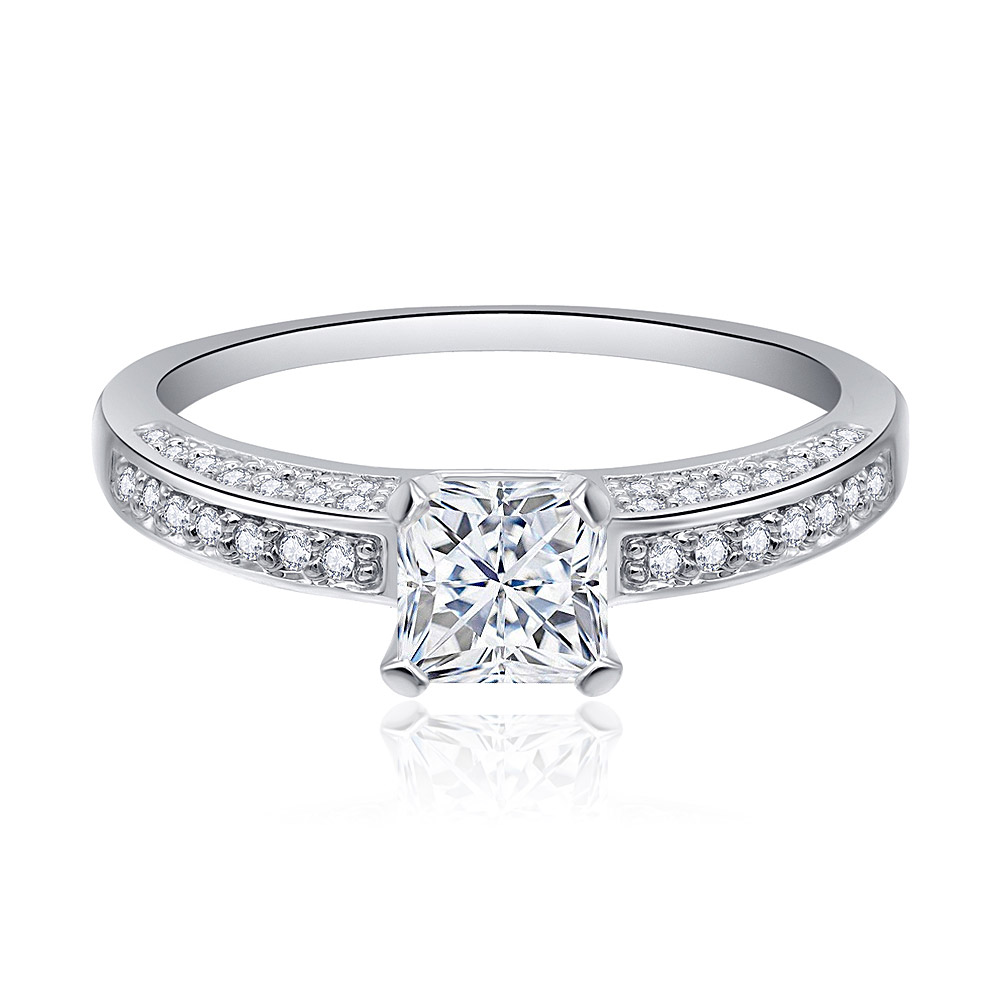 Princess Cut 5MM CZ Ring featuring a square-cut cubic zirconia center stone and round side stones on a rhodium-plated band.