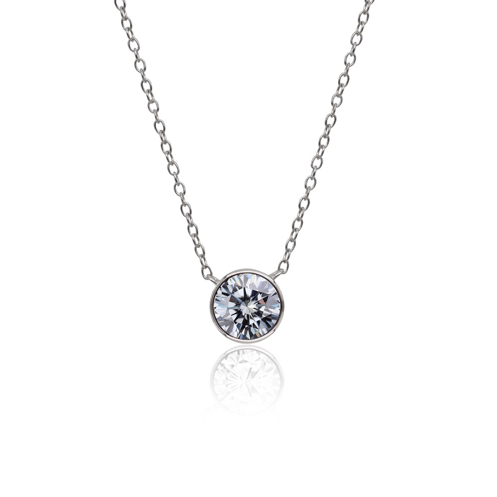 A classic solitaire CZ pendant necklace with a brilliant round-cut stone on a delicate rhodium-plated chain, displayed against a white background.