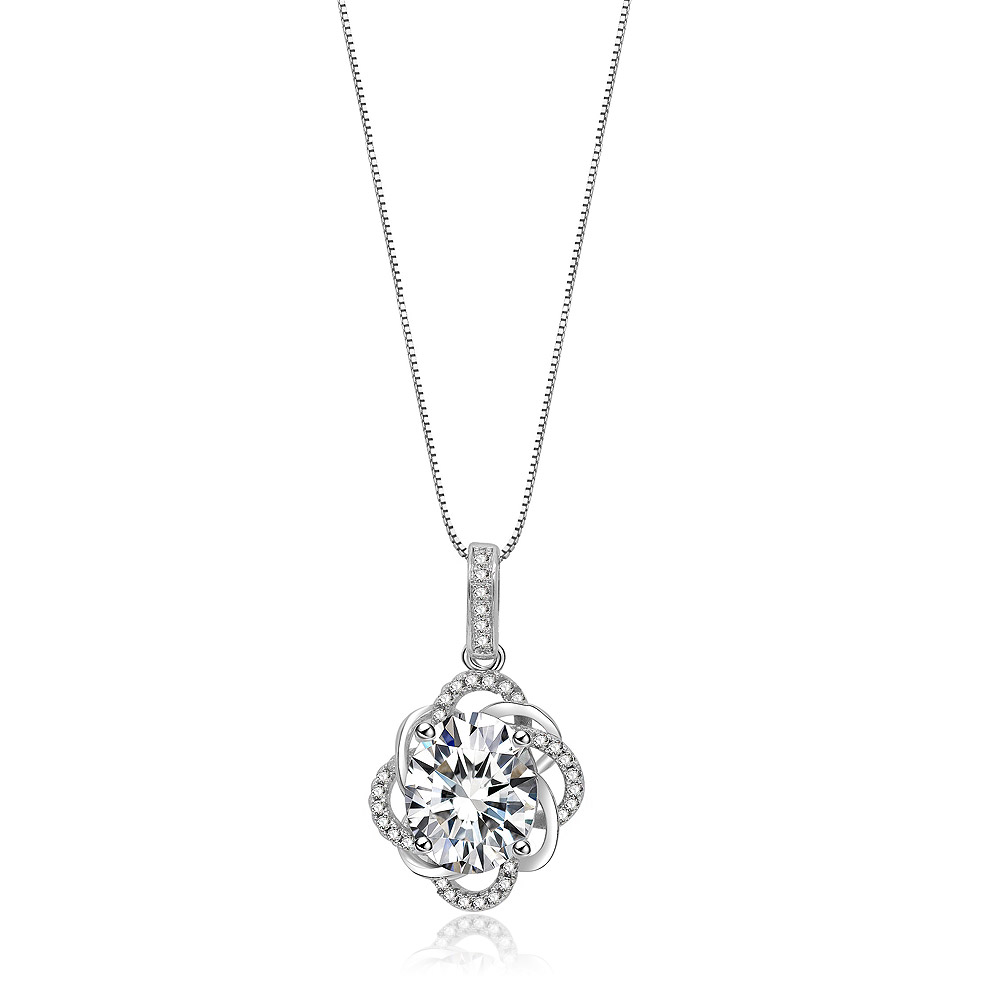 Close-up of the Glistening Pendant necklace, showcasing its rhodium-plated finish and a central cubic zirconia stone surrounded by smaller stones in a floral design.