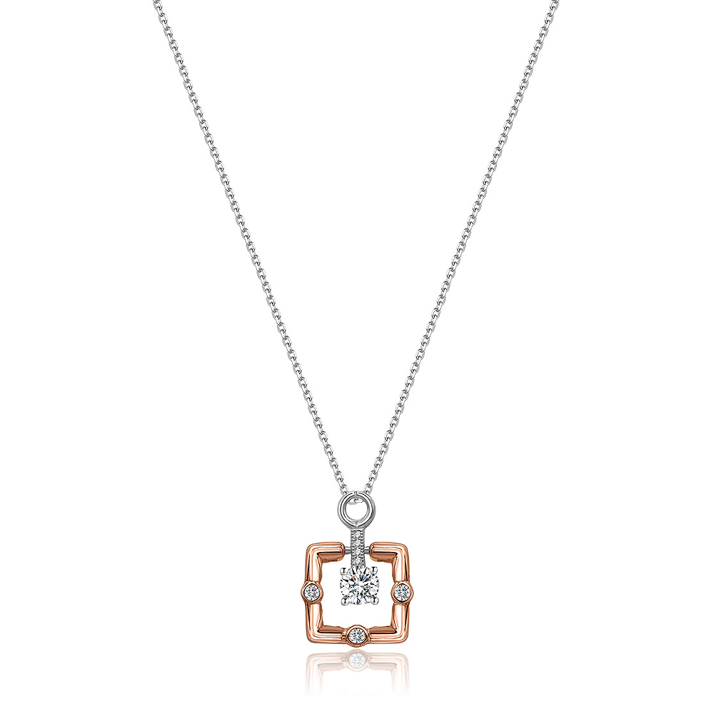A close-up of the Two Tone Square Pendant Necklace, featuring a central Swarovski crystal set in 925 sterling silver with rhodium and rose gold plating, on a white background.