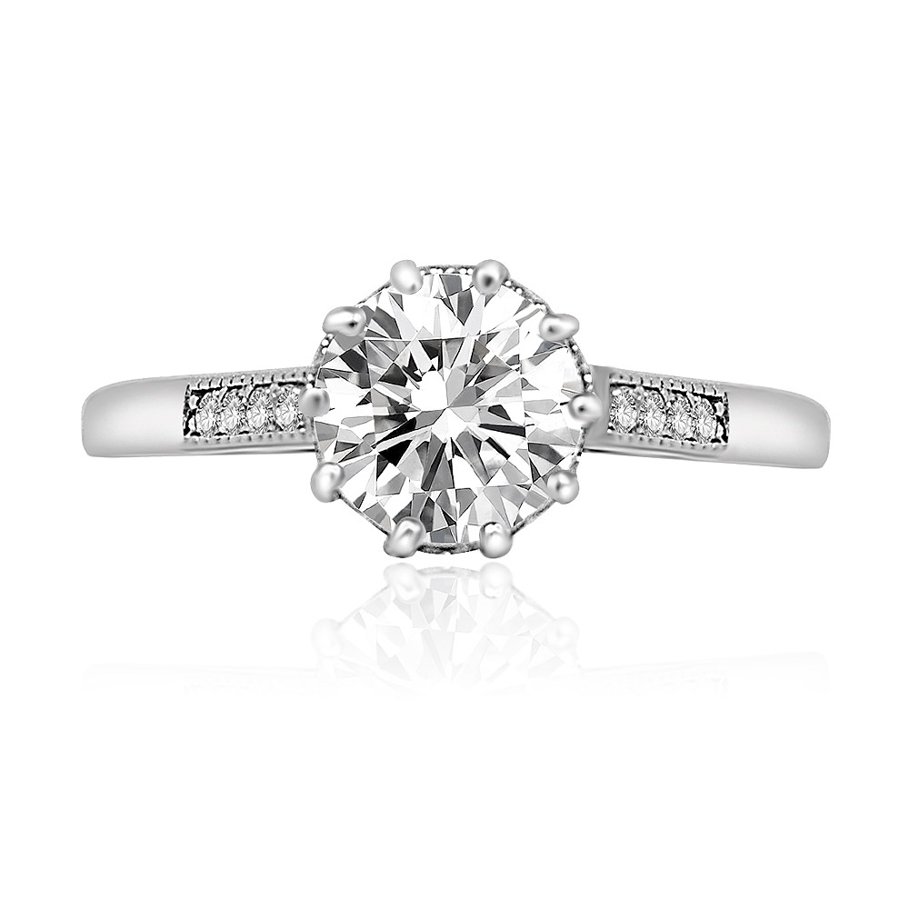 Front view of the 10 Prong Round Cut Ring, showcasing the prominent round-cut cubic zirconia and the single row of pave accents on the rhodium-plated band.