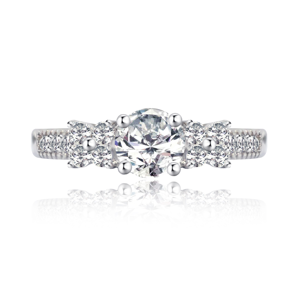 Front view of the Dreamy Bridal Ring, showcasing three princess-cut cubic zirconia stones on a rhodium-plated band with milgrain details.