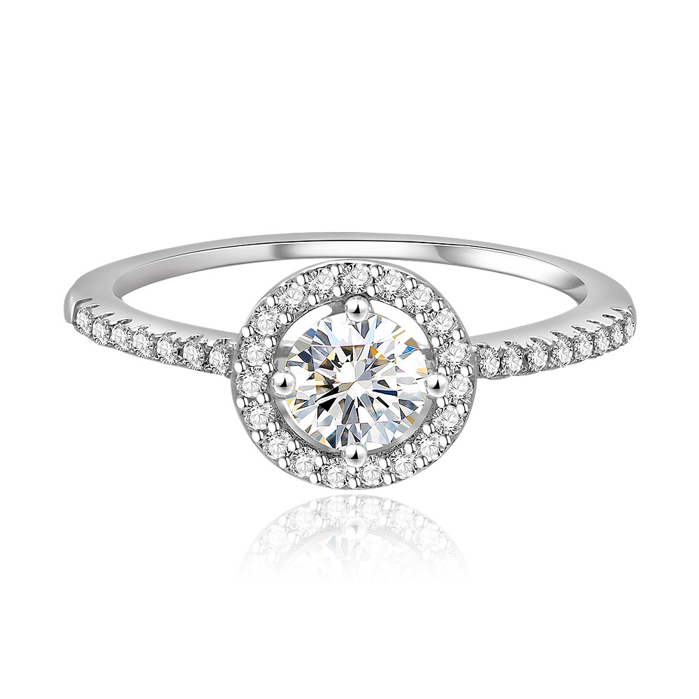 Front view of the Minimal Circle Ring, showcasing its brilliant rhodium-plated finish and a central round white cubic zirconia stone on a white background.