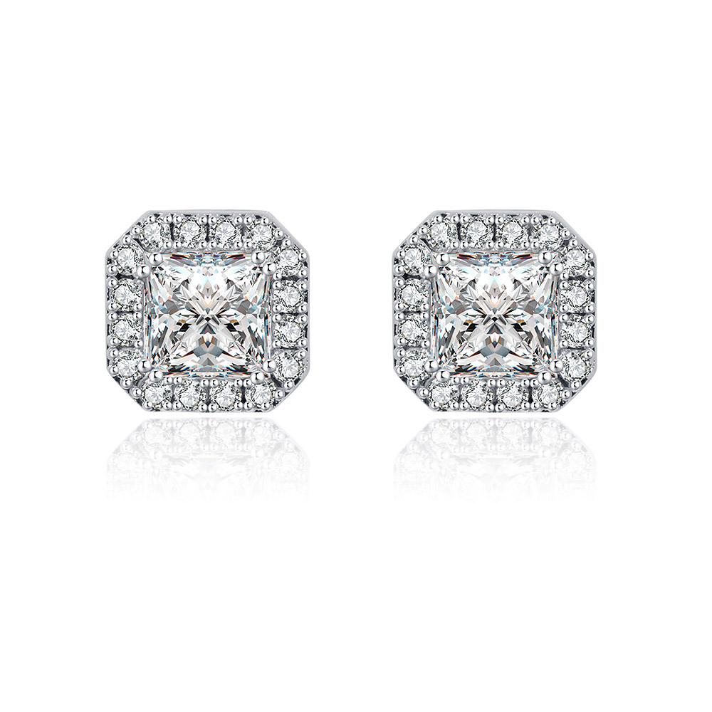 A pair of Mini Zirconia Cushion Stud Earrings featuring square-cut center stones with a halo design, crafted in rhodium-plated brass.
