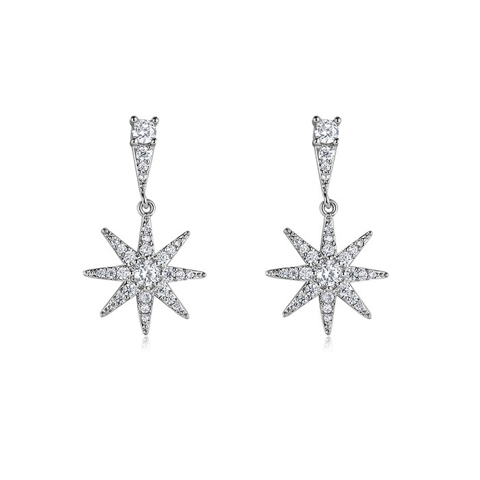 A pair of Tiny Starburst Drop Earrings with sparkling cubic zirconia, rhodium-plated finish on a white background.