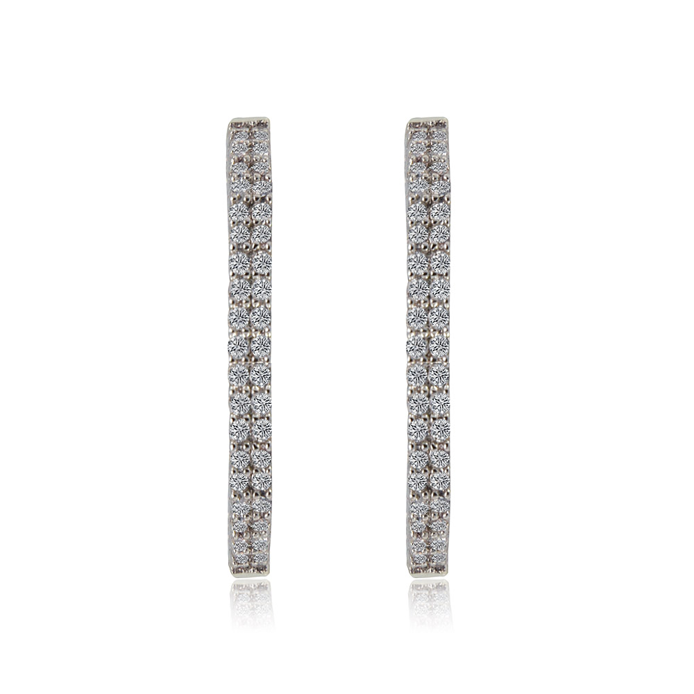 A close-up view of the Hot Sparkle Hoop Earrings, showcasing the brilliant rhodium plating and the sparkling white cubic zirconia stones set in the brass hoop.