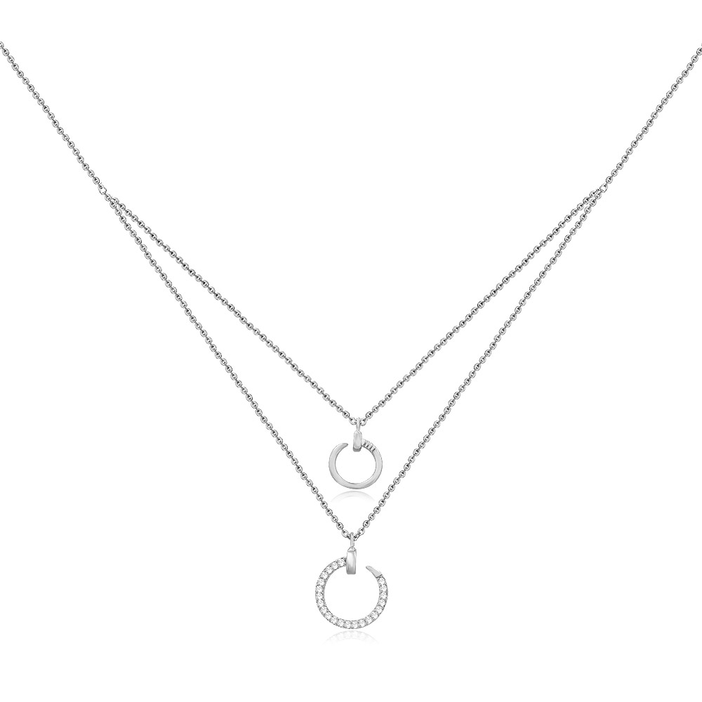 A stylish double-layered rhodium-plated necklace featuring two circular pendants, one polished and one encrusted with sparkling cubic zirconia stones.