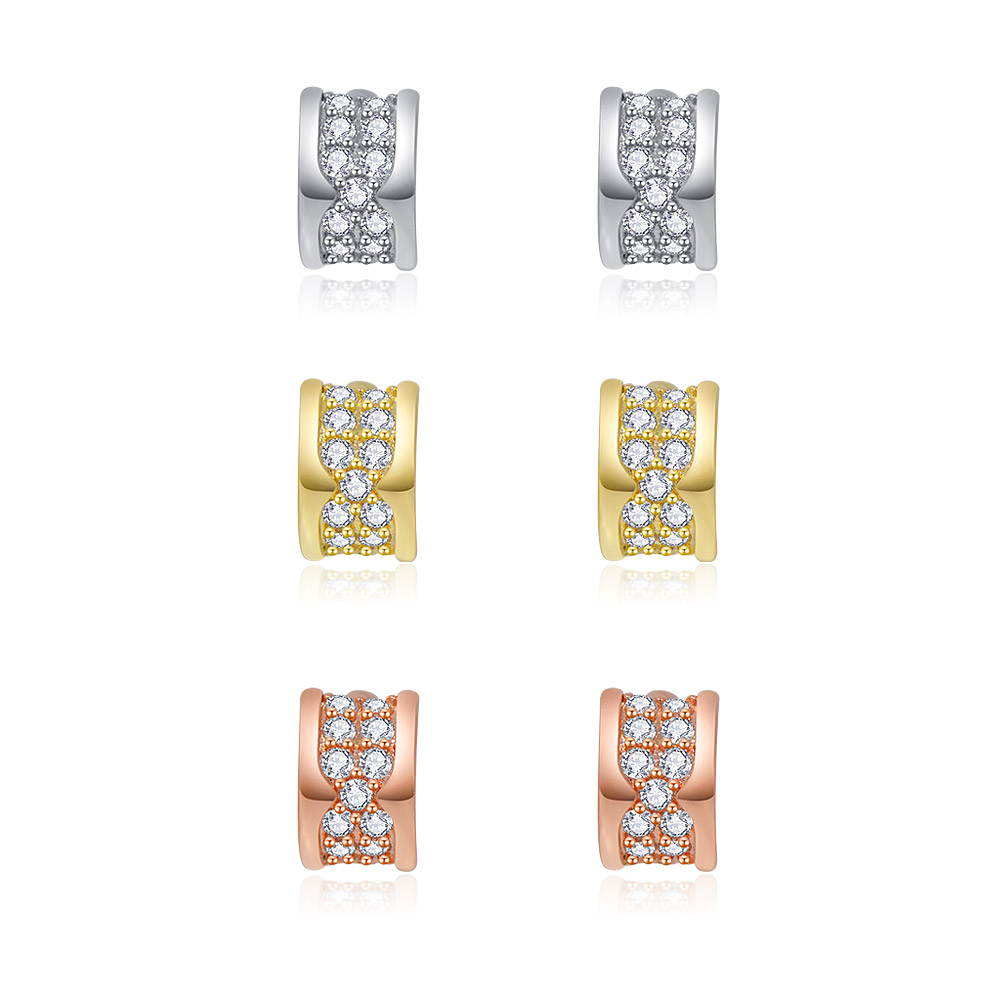 Mini Curved Pave Earring Set displaying three pairs of stud earrings in silver, gold, and rose gold finishes, each adorned with cubic zirconia.