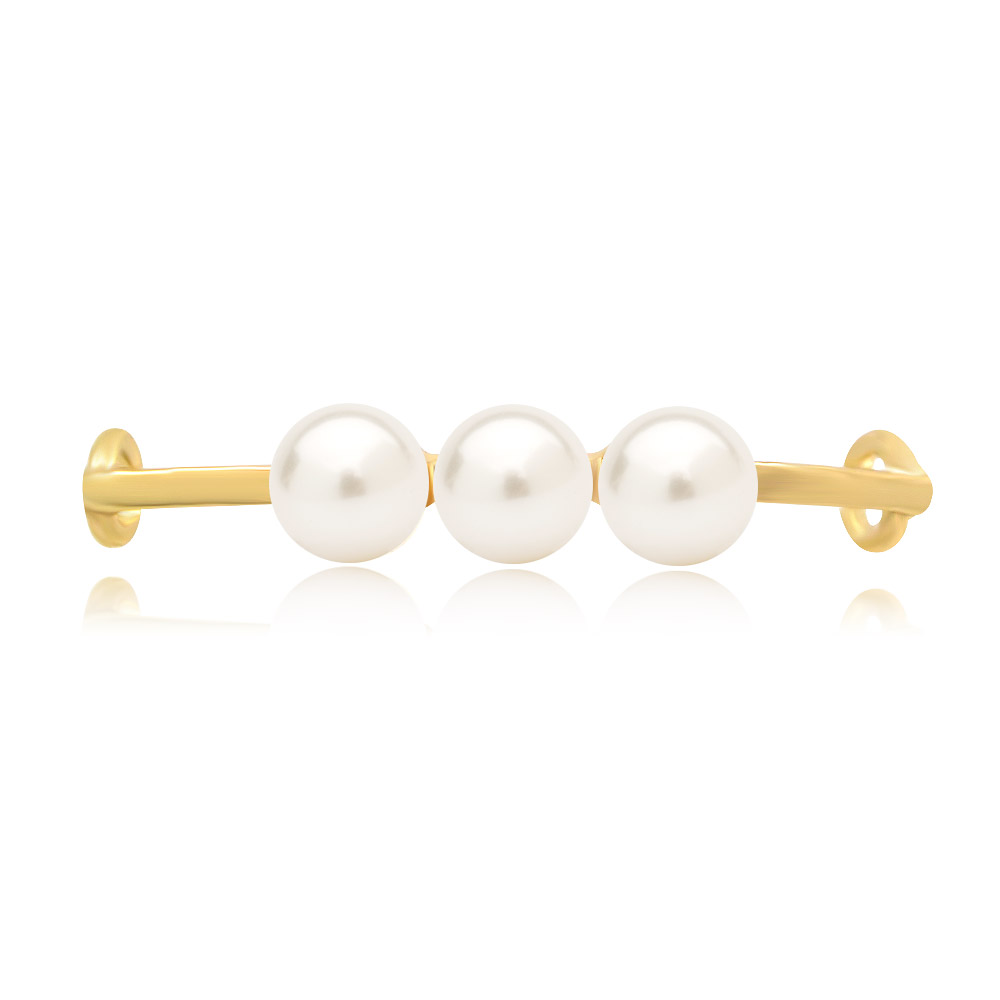 A close-up of a gold-plated triple pearl shoe tag on a clean white background.