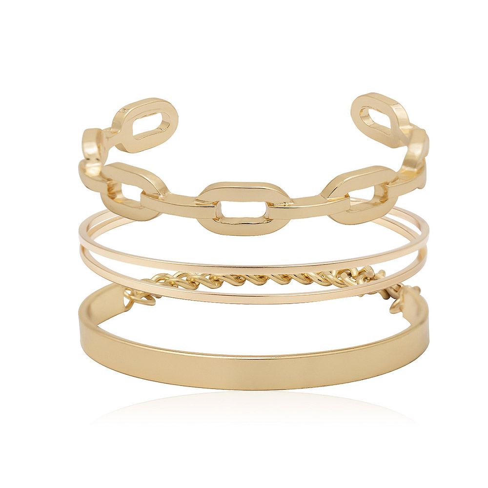 A stylish stack of various gold bangles and bracelets from JR Fashion Accessories, showcasing their wholesale collection.