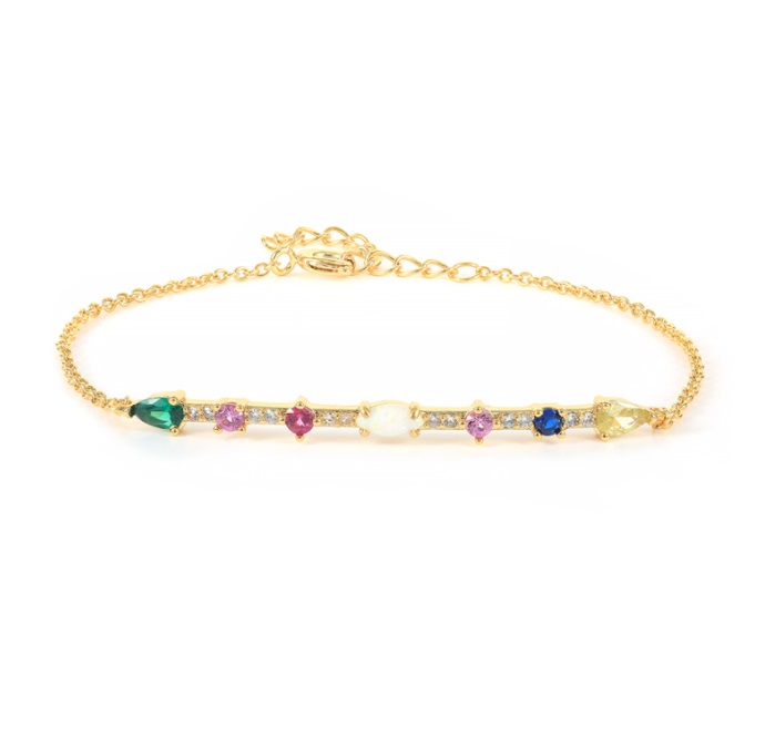 A stunning gold-plated tennis bracelet featuring a continuous line of vibrant, multi-colored cubic zirconia gemstones on a clean white background.