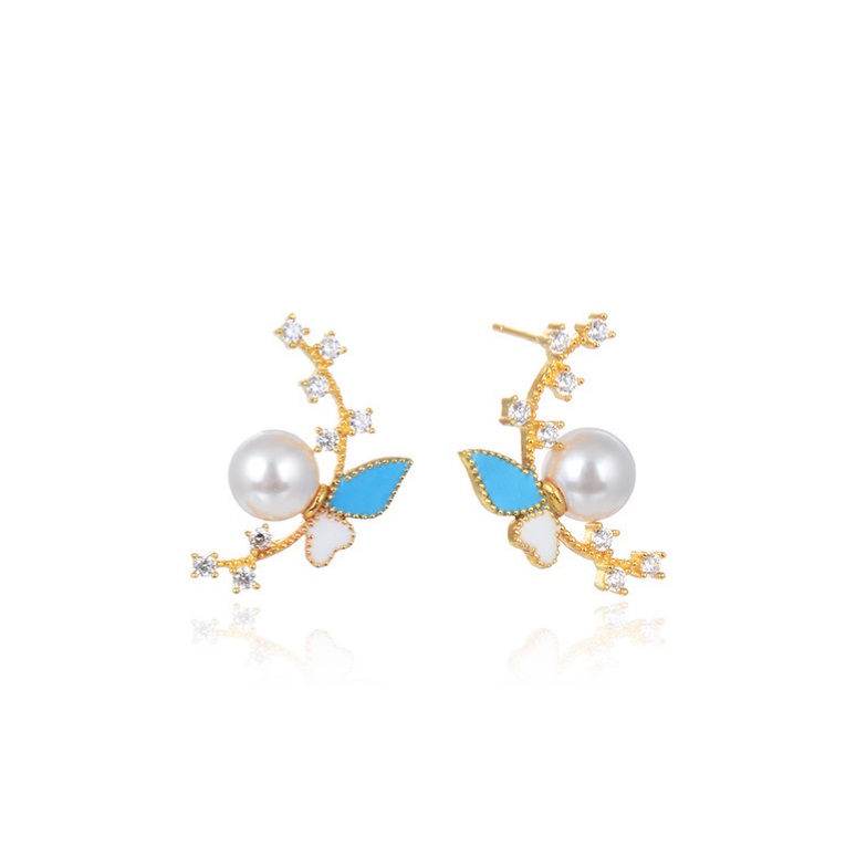 A pair of 925 sterling silver pearl butterfly earrings with gold plating, featuring blue and white enamel details and sparkling cubic zirconia gemstones.
