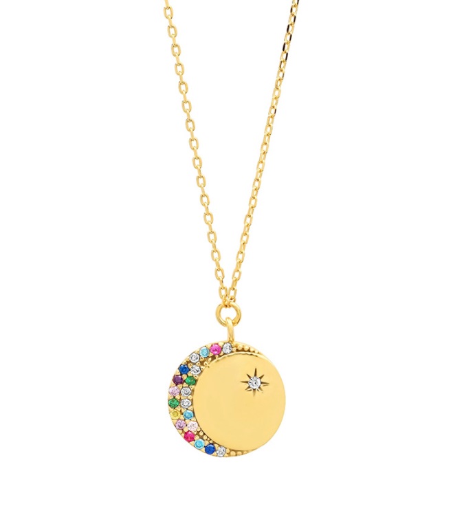 Gold necklace with a crescent moon pendant featuring multicolored gemstones and a star design.