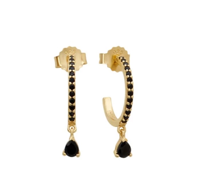 A pair of gold-plated hoop earrings featuring a curved design set with small and large teardrop-shaped black cubic zirconia gemstones.