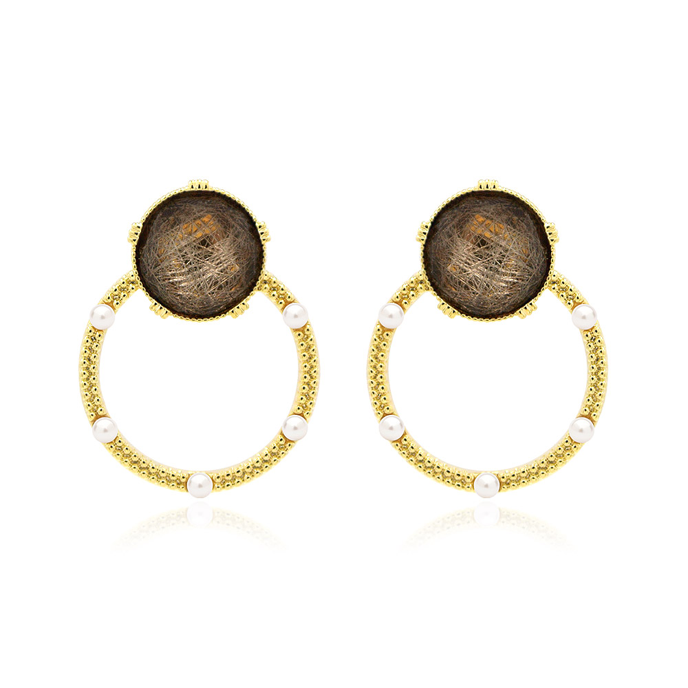 A close-up view of the Brown Glitter Resin Gold Earrings, showcasing the gold-plated brass, sparkling brown resin, and delicate white pearl details.