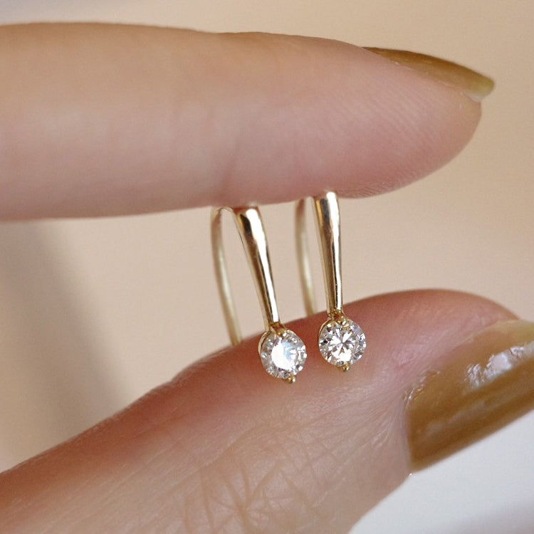 A close-up of the 925 Silver Shimmering Gold Zircon Threader Line Drop Earrings, showcasing the intricate design and sparkling gemstones.