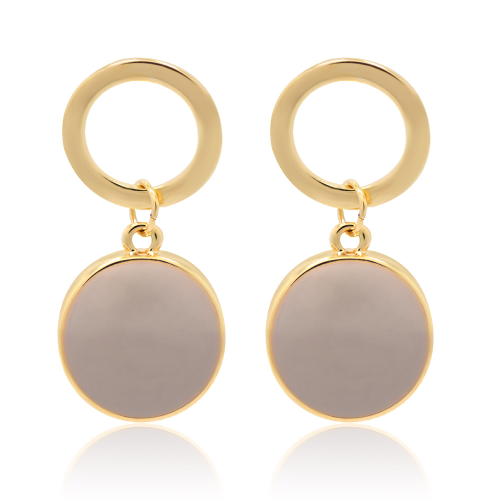 A pair of Spring Purple Enamel Round Disc Earrings, featuring gold-plated brass studs with circular light purple enamel pendants.