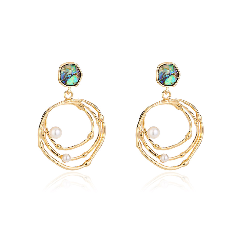 A pair of Delicate Pearl Round Wire Hoop Earrings in gold, featuring elegant pearl accents and shimmering iridescent stones, showcasing a minimalist design.