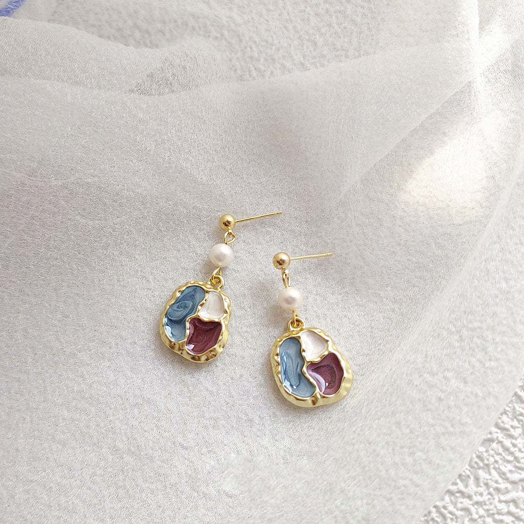 A pair of retro-style drop earrings from the 5-pair set, featuring gold-plated brass, vibrant multicolored enamel splicing, and an elegant irregular freshwater pearl.